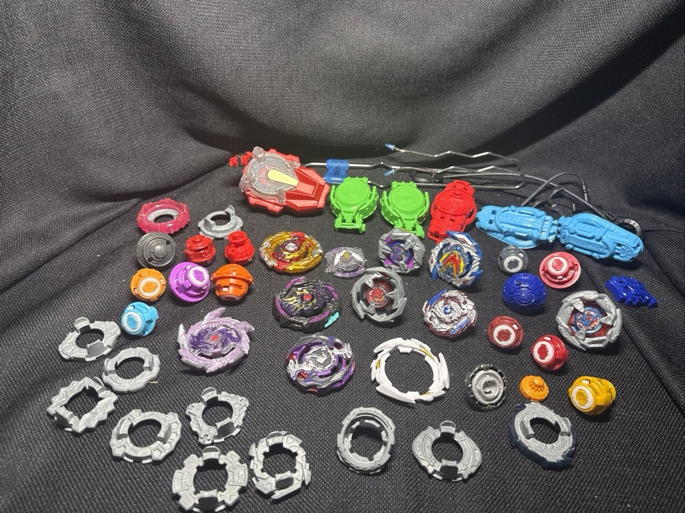 Beyblades Lot.Lot Comes With Everything Shown In Pics. Launchers And Spinners