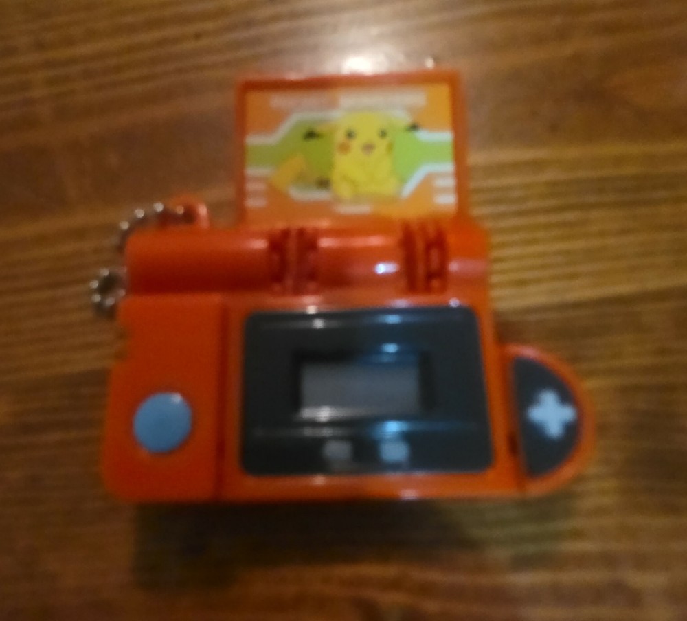 Pokémon Mini Pokédex Toy Keychain – Pikachu Graphic – Orange Collector Gadget