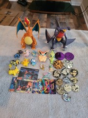 Pokémon Mixed Lot Of Figures, Coins, Pins, Tops Trading Cards