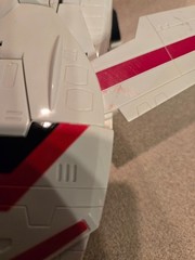Vintage 1985 Transformers G1 Jetfire figure with accessory pieces.