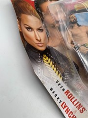 WWE Battle Pack – Seth Rollins & Becky Lynch & Bushwhacker Autographed Pic