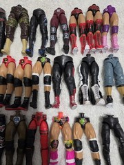 MATTEL WWE LOT OF PARTS, THIS ONE IS LOWER BODIES. LOT C