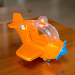 Vintage Tumble Wheels Dome Top Post Office Mail Airplane Orange Plastic A47