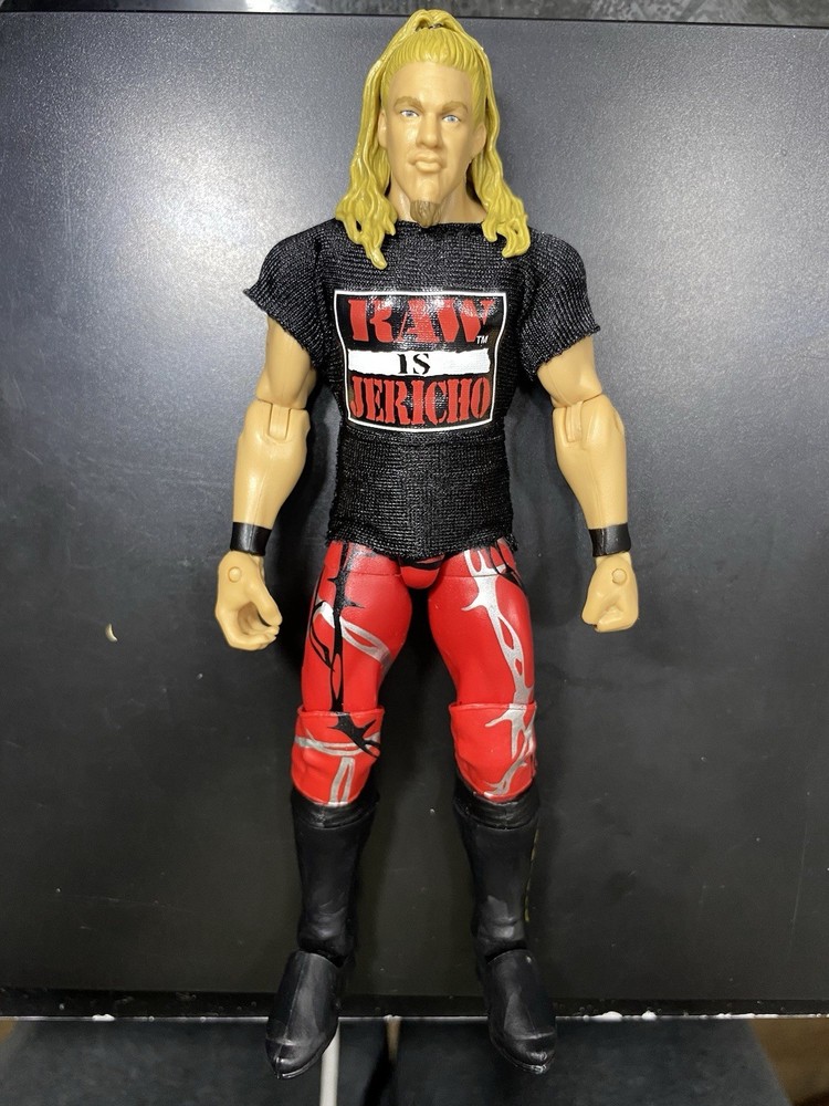 WWE Chris Jericho Wrestling Action Figure w/ RAW Is Jericho Shirt, Red Pants