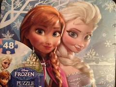 Disney “Frozen” & “Doc McStuffens” 48 Pc Puzzles in Lunch Boxes, Both Brand New!