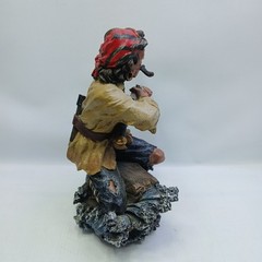 Resin Pirate 10″ Statue with Knife, Musket & Pistol on a bench with treasures