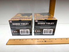 Two SKIBIDI TOILET MYSTERY COLLECTOR figures (NIB)