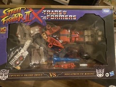 NEW 2022 Takara Tomy 35th Street Fighter II x Transformers Optimus vs Megatron