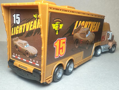 Disney Pixar Cars 3 Chester Whipplefilter #15 Mack Hauler Diecast Deluxe 1:55 FC