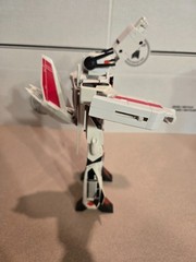 Vintage 1985 Transformers G1 Jetfire figure with accessory pieces.