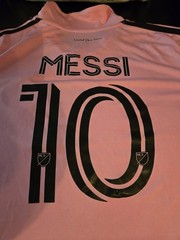 Lionel Messi FIFA 2026 World Cup Sports Figure & Pink Miami Collared Jersey NWT