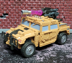 Warbotron WB01-C Sly Strike figure – complete with box and sleeve