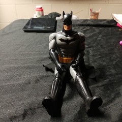 batman action figure plastic fabric gray black yellow suit cape
