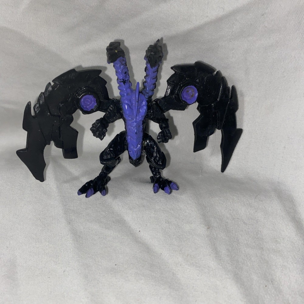 Bakugan Mystery Figure Nillious – Black & Purple with Green/yellow Eyes