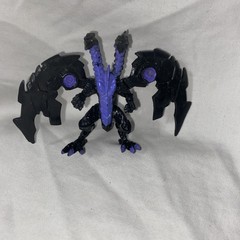 Bakugan Mystery Figure Nillious – Black & Purple with Green/yellow Eyes