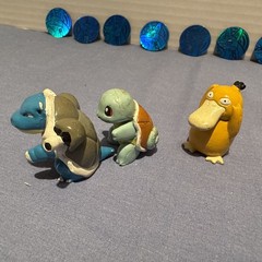 1999 POKÉMON FIGURES AND COINS SET WITH TWO-“RARE” PURPLE AND TRANSLUCENT FIGS