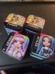 Rainbow High Surprise collectible Tins: VIOLET, SUNNY, SKYLER, SUNNY. USED. READ
