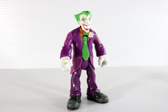 Fisher-Price DC Super Friends Hero World Joker 5″ Figure Toy with Pie Thrower