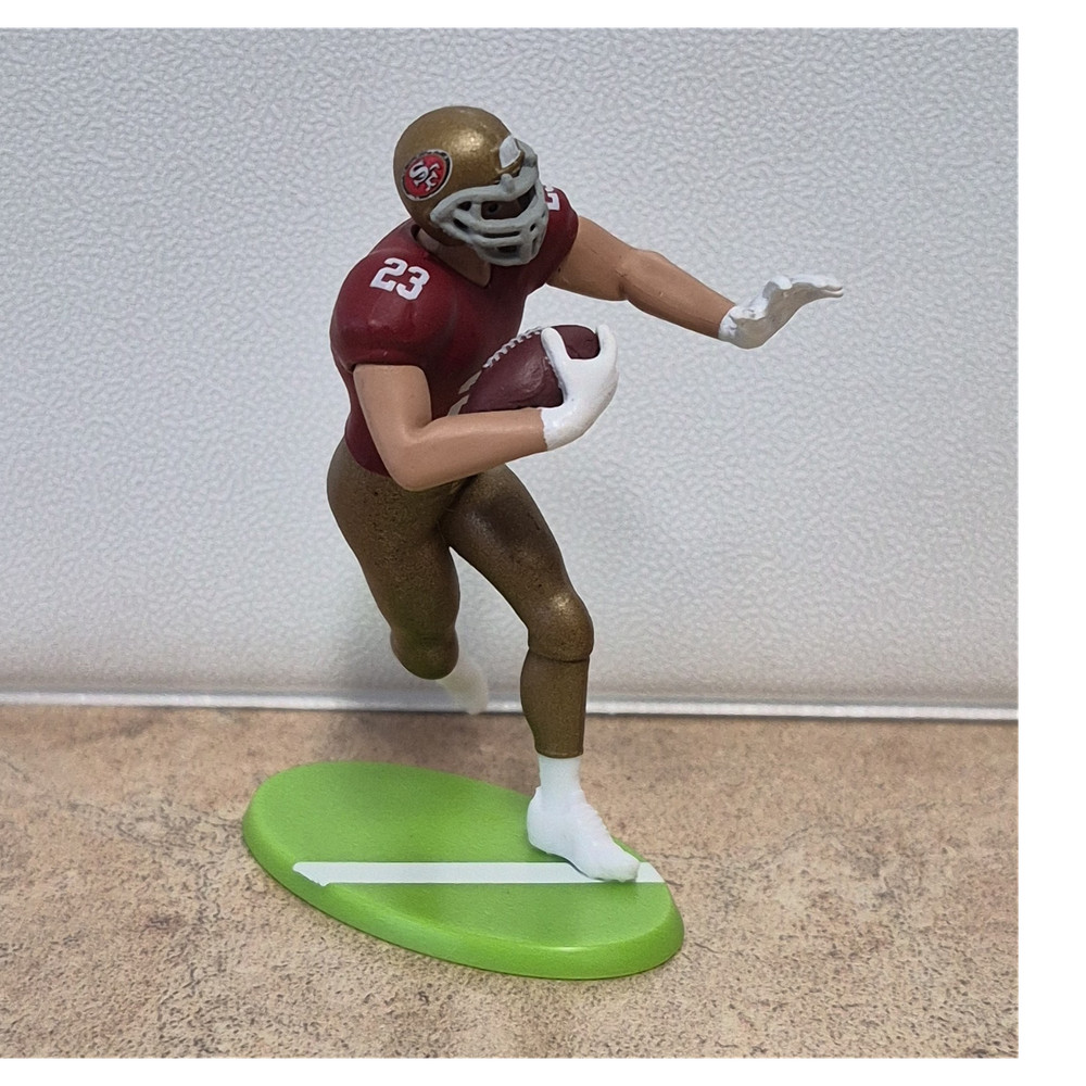 San Francisco 49ers McCaffrey #23 Action Figure Red Gold Uniform Football