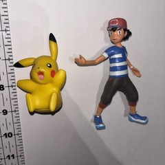 Pokemon vinyl action figures Ash Ketchum 4.25” Tall and Pikachu