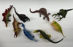 Lot of 8 Mixed Toy Plastic Rubber Dinosaurs. Tallest Around 4”.