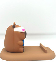 Capybara Phone Stand Flexible Plastic PVC w/ Capybara Figure Playing Video Games