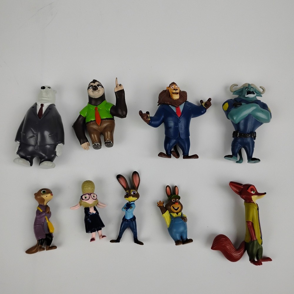 Disney Zootopia Figure Lot of 9 Nick Wilde Judy Hopps Flash Sloth Chief Bogo Toy