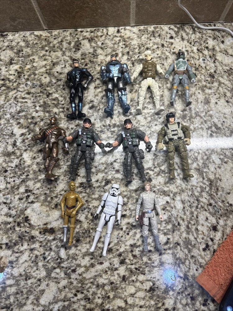 Lot Of 11 Star Wars, DC comics, & Loose Action Figures, No Accessories