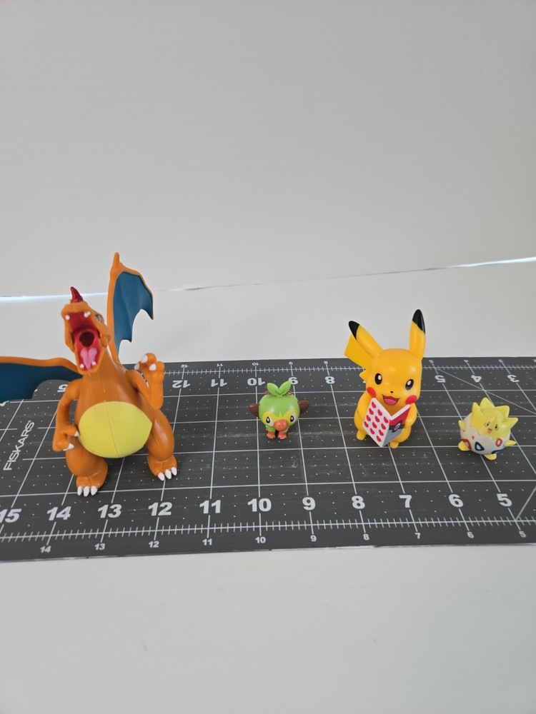 Lot of 4 Pokémon Figures Charizard Grookey Pikachu w/ Rotom Pokédex Togepi…