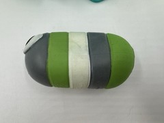 Bonkers Toys Slither.io Mini Mystery Squishy Slither Teal Case Green Grey White