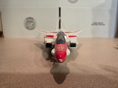 Vintage 1985 Transformers G1 Jetfire figure with accessory pieces.