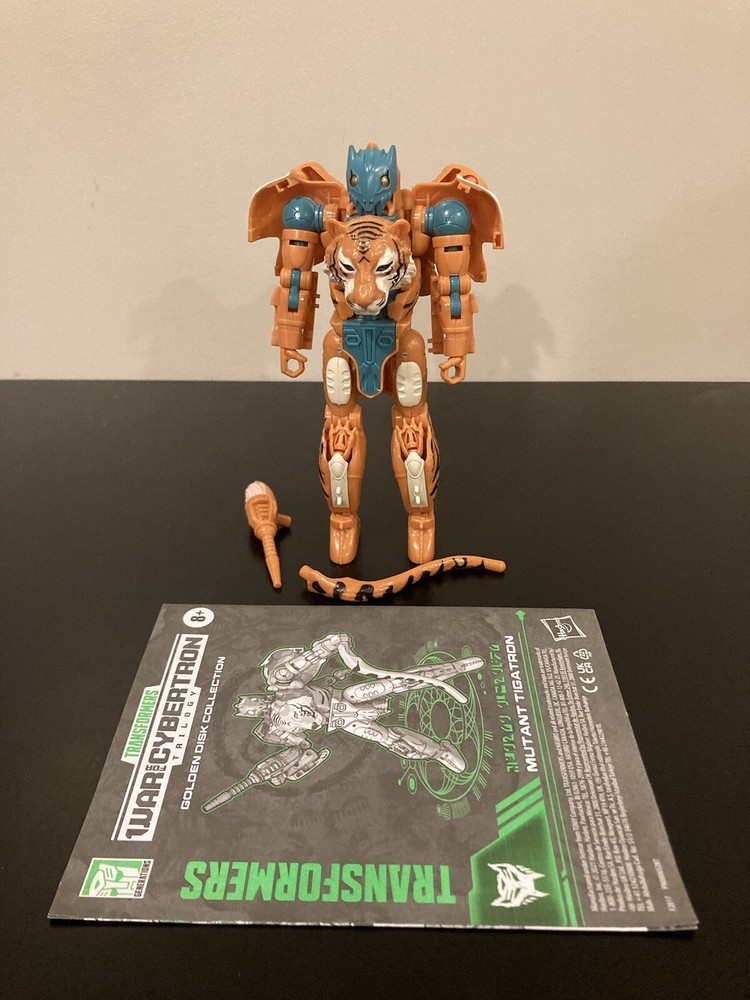 Transformers WFC Kingdom Golden Disk Collection Mutant Tigatron
