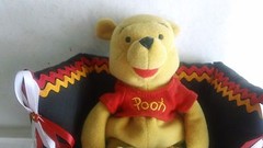 Stuffed Winnie the Pooh, Sitting on Couch – Decorator Item