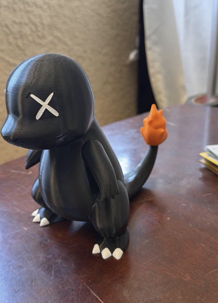 Pokemon Charmander Figure Black Plastic with X Eyes Orange Tail Flame