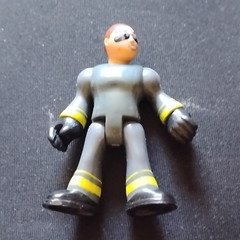Human Action Figure Toy, Plastic, Gray Outfit w/ Black & Yellow Stripes