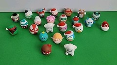23 Mini Rubberized Squishmallows Toys.