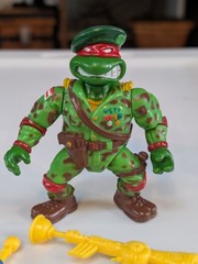 Playmates “Raph, the Green Teen Beret” action figure from the 1991 Near Complete
