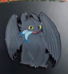 How to Train Your Dragon Sitting Toothless Eating Fish Exclusive Loungefly Pin