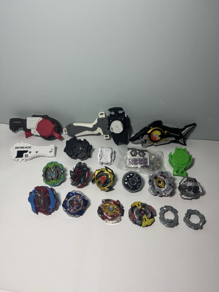 Beyblade Lot – Beyblades, Parts, and Launchers – See Photos & Read Desc