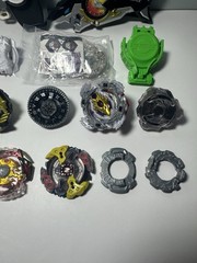 Beyblade Lot – Beyblades, Parts, and Launchers – See Photos & Read Desc