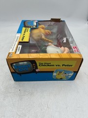 Mezco Family Guy the Giant Chicken vs Peter Figure Set Sealed. Box is damaged.