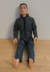 Fully Jointed Male Action Figure with Brown Hair & Clothing Plastic Beige