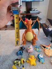 Pokémon Mixed Lot Of Figures, Coins, Pins, Tops Trading Cards