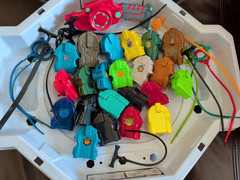 Mixed Beyblade Lot: Metal Fusion, Burst, 2 Stadium Arenas, Case, Launchers As Is