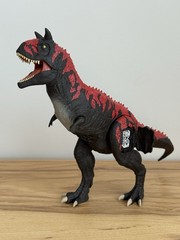 Legacy Collection Reimagined Roarin’ Real Feel Carnotaurus Action Figure – WORKS